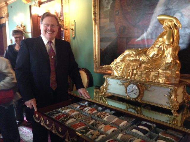 Ron McCarty, Curator of Ca'd'Zan, shows Historical Socierty members John Ringling's haberdashery